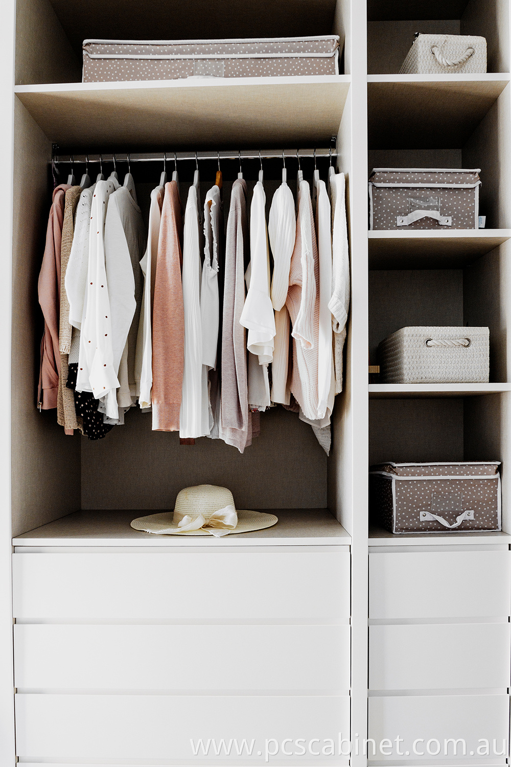 Closet With Clothes Hanging Organizing And Order